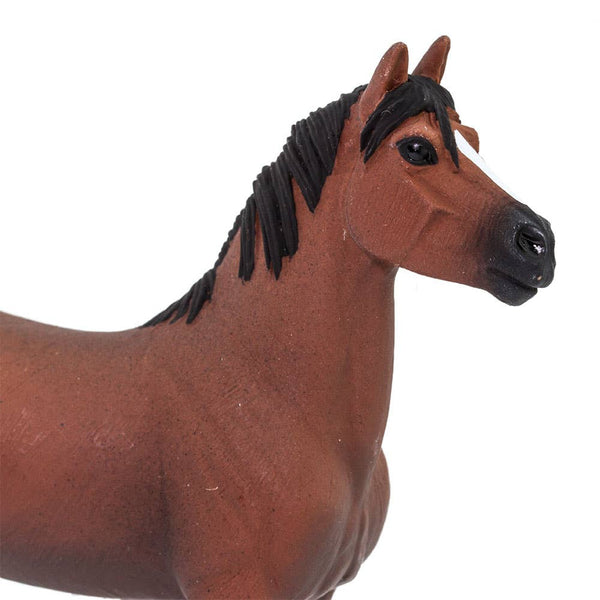 This Morgan Stallion figure is 4 ¾ inches long and 4 ¼ inches tall to the top of its ears. It's about the size of a standard 11-ounce ceramic mug. This horse features a chestnut brown coat with a black nose, mane and tail. He's got two black socks and two white socks, and his hooves are black with silver shoes