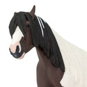 Brown and cream horse with a flowy tail and  mane