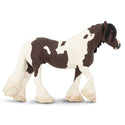 Brown and cream horse with a flowy tail and  mane