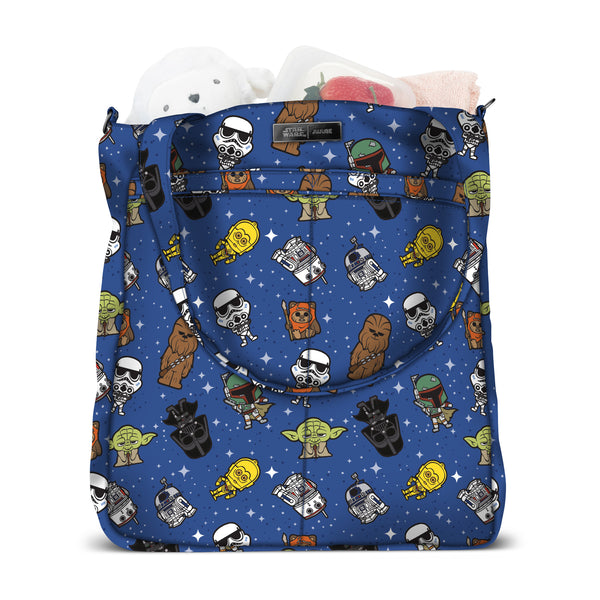 Diaper bag with blue background. It has cartoon style star wars characters all of it. 