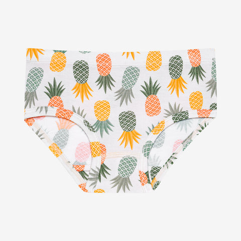 One Pair of Brief Underwear with white background with Light Green, Dark Green, Orange, Yellow Pineapples all over it. 