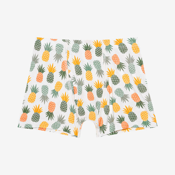 First Boxer Brief. White background with pineapples. Colors are Dark green, Light Green, Orange, yellow,