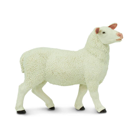 Primarily white, this 3-inch-long ewe features additional color on the hooves and about the face,