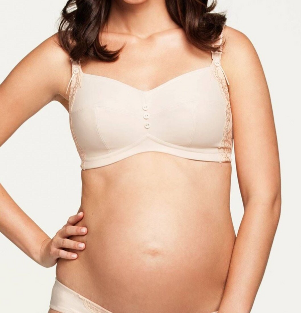 Close up of front of bra. The bra has lace on the side and cute buttons down the middle.