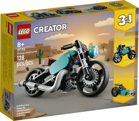 Lego Creator Vintage Motorcycle in box. Motorcycle is teal and black. 