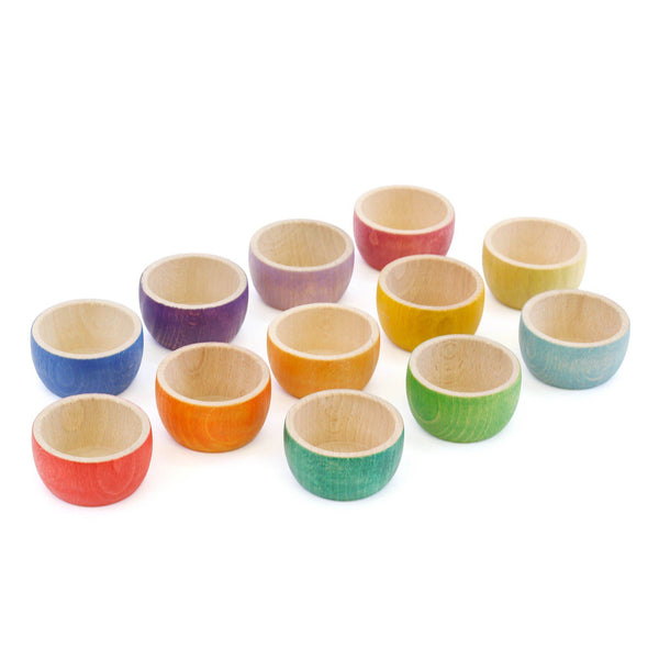 Set Of 12 Wooden Bowls that are eco-friendly and safe Toys for your children. Colorful and fun to fill.