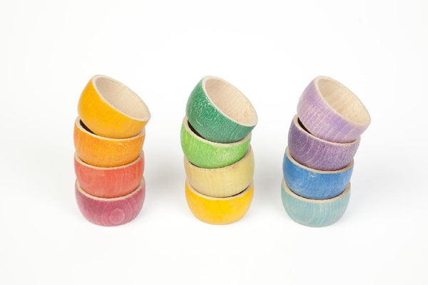 Set Of 12 Wooden Bowls that are eco-friendly and safe Toys for your children. Colorful and fun to fill.