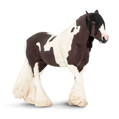 Brown and cream horse with a flowy tail and  mane