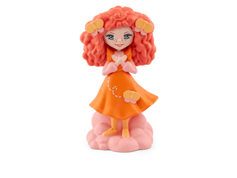 Toy figure of a girl with red hair and an orange dress on a white background