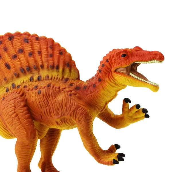 Our Great Dinos Spinosaurus toy is 11 inches long and 6 inches high, and features a vibrant orange and yellow paint scheme, with black spots on its neck, sail, and tail.