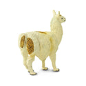 Long hair llama with a cream coat and large brown spots