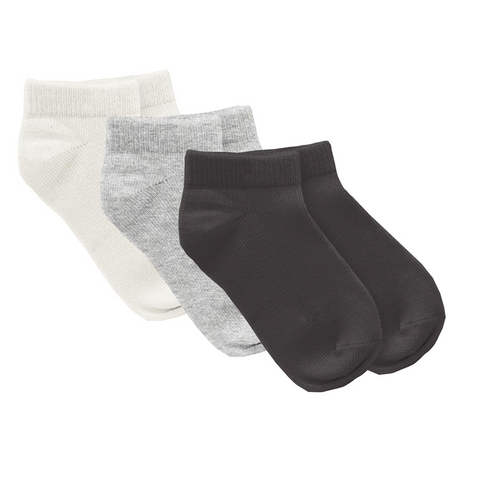 3 pairs of socks. Natural, Gray, and Black