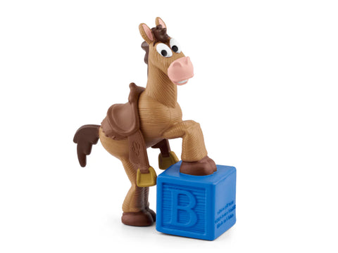 Toy horse figure with a blue block featuring the letter 'B' on a white background