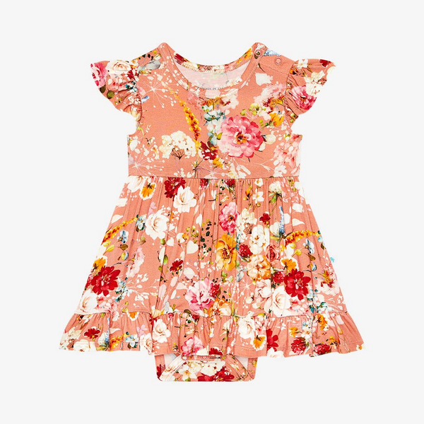 Body suit dress. Print is orange, red, yellow and white floral on a peachy background.