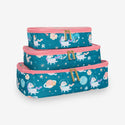 Pack of 3 zippered travel cubes stacked.  Print is unicorns in space. Blue background with peachy pink trim.
