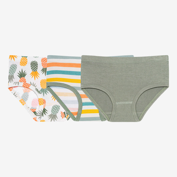 This shows all three brief underwear. One is the white background with Light Green, Dark Green, Orange, Yellow Pineapples all over. One has a white background with Aqua, Orange, yellow, and Sage Green Stripes. and the third pair is a solid sage green.