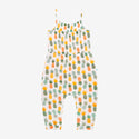 Jumpsuit has a white background with Light Green, Dark Green, Yellow, and Orange Pineapples all over it.