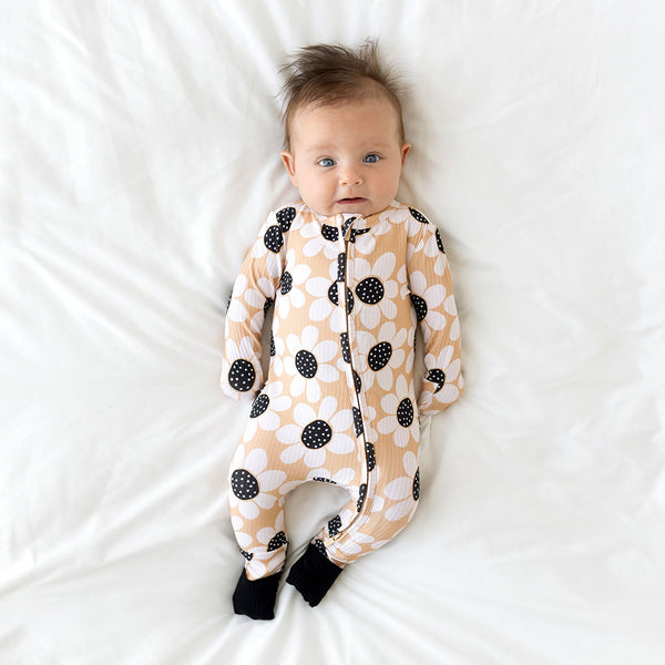 Sunflower print with black convertible footbands.