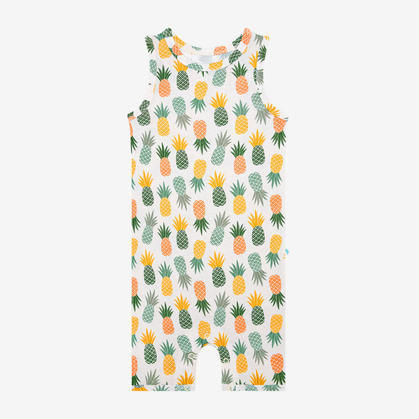 This print has a white background with Pineapple print. Light Green, Dark green, Orange, and Yellow Pineapples are repeated all over.