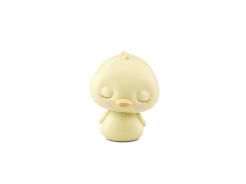 Small yellow figurine of a baby duck on a white background