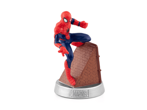 Spiderman figurine balancing on brown roof.