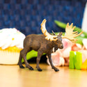 Complete with its massive antlers, thick coat, and humped back, this life-like moose toy figurine captures the spirit and majesty of this enormous animal.