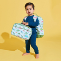 boy carrying Lunch Bag in a Dinosaur Print with Green Trim