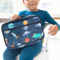 boy holding lunch bag with a cosmic scene of planets, stars, and rockets