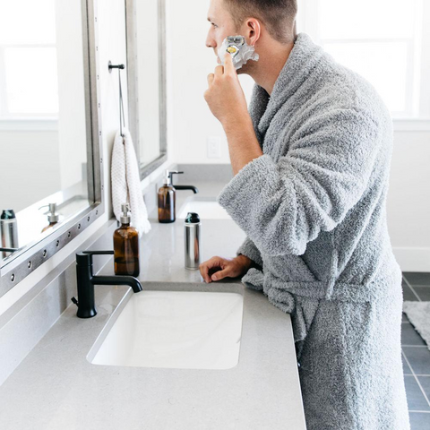 Gray Robe. Man Shaving