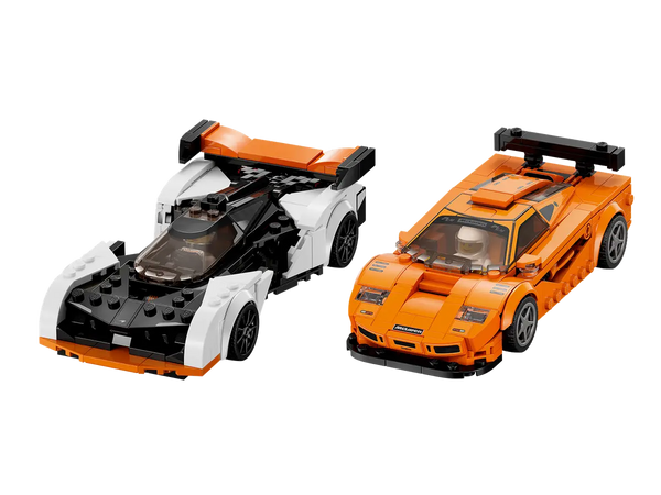 2 Mclaren race cars. One is Orange and one is white