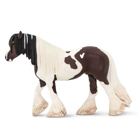 Brown and cream horse with a flowy tail and  mane