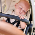 baby sleeping inSwitchback stroller frame by Veer