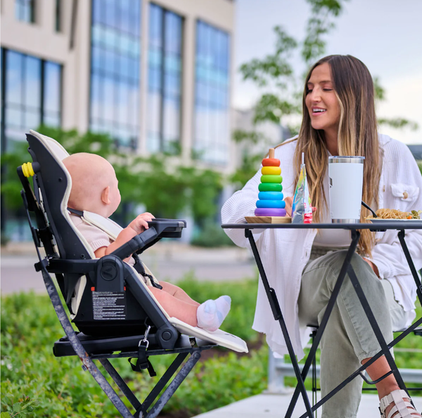 woman and child with veer switchback highchair