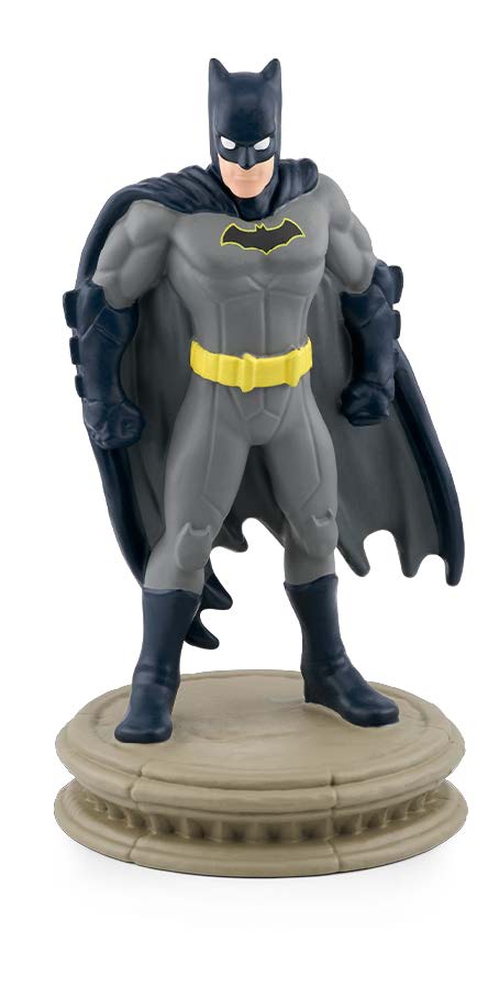Batman dressed in his batman costume.