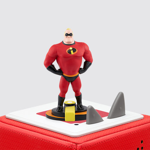 Tonies the Incredibles character Bob Parr in his red incredibles suit on top of a red toniebox.