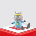 Tonies Hippo character. Grey hippo with yellow headband and blue jumpsuit sitting on a red Toniebox.