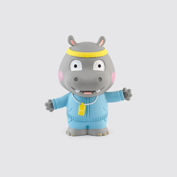 Tonies Hippo character. Grey hippo with yellow headband and blue jumpsuit.