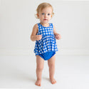 Toddler standing in a Blue and white checked bloomer set