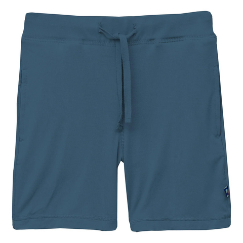 These Drawstring shorts are in a solid deep sea blue color.