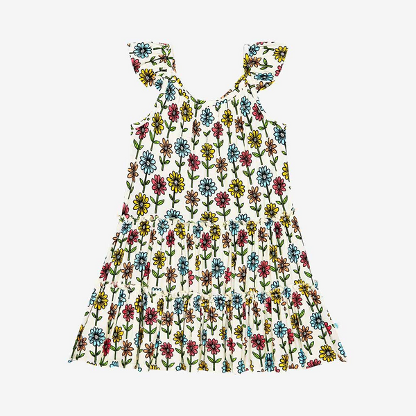 3 Tiered Dress with Flutter Sleeves. The dress Print is a floral on a cream background. The Flowers are single daisies on stems and vary in color. Light Blue, Yellow, light orange, and pink.