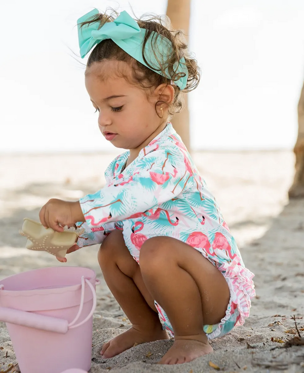 RuffleButts | Long Sleeve One Piece Rash Guard ~ Vibrant Flamingo Clothing RuffleButts 18-24m  